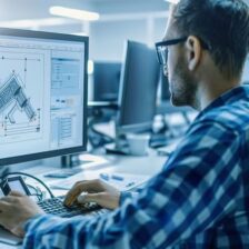 Engineer Working on CAD Software in Office