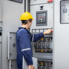 electrical engineer looking at panel