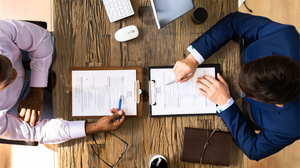 two people reviewing a resume