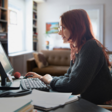 woman sitting at computer